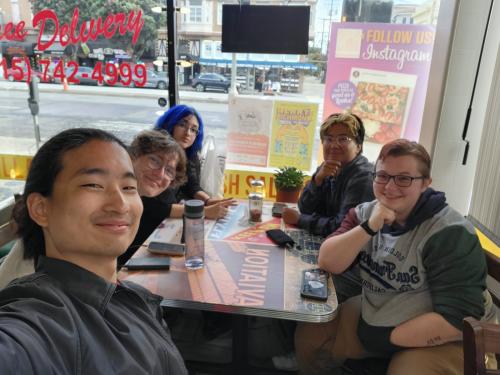 group seated for casual dinner at a restaurant 