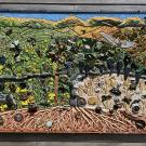 Secret life in a vineyard -- ceramic mural